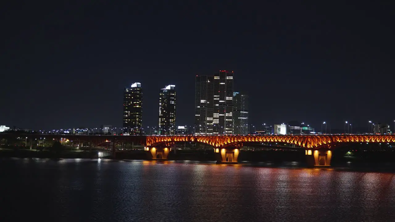 Seongsu Bridge in capital city Seoul lit up by street lights crossing Han River at night