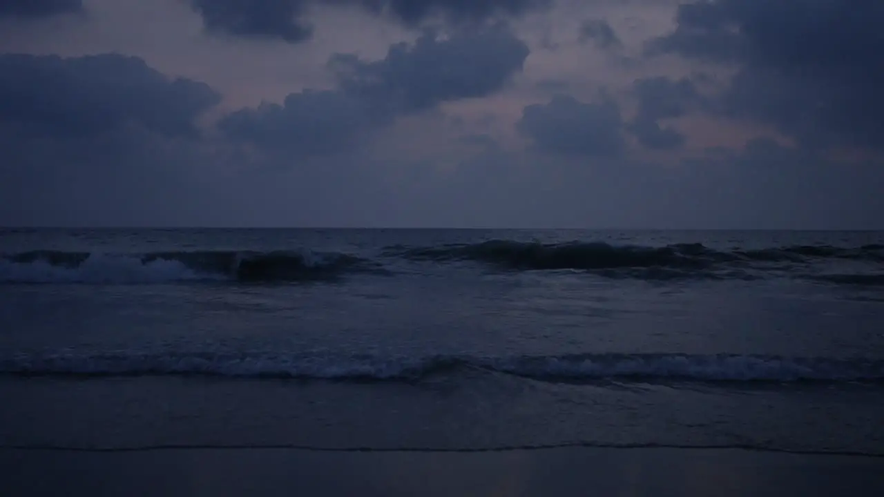 Ocean with small waves at late sunset