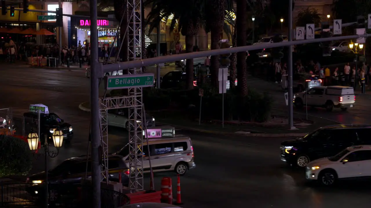 Slow motion high angle view of traffic at busy intersection in Las Vegas at night