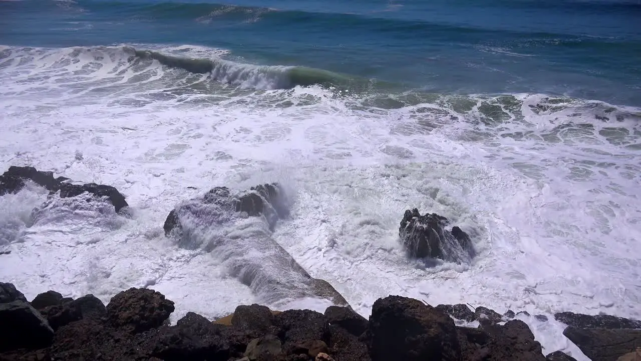 Large waves crash along a Southern California beach near Malibu 2