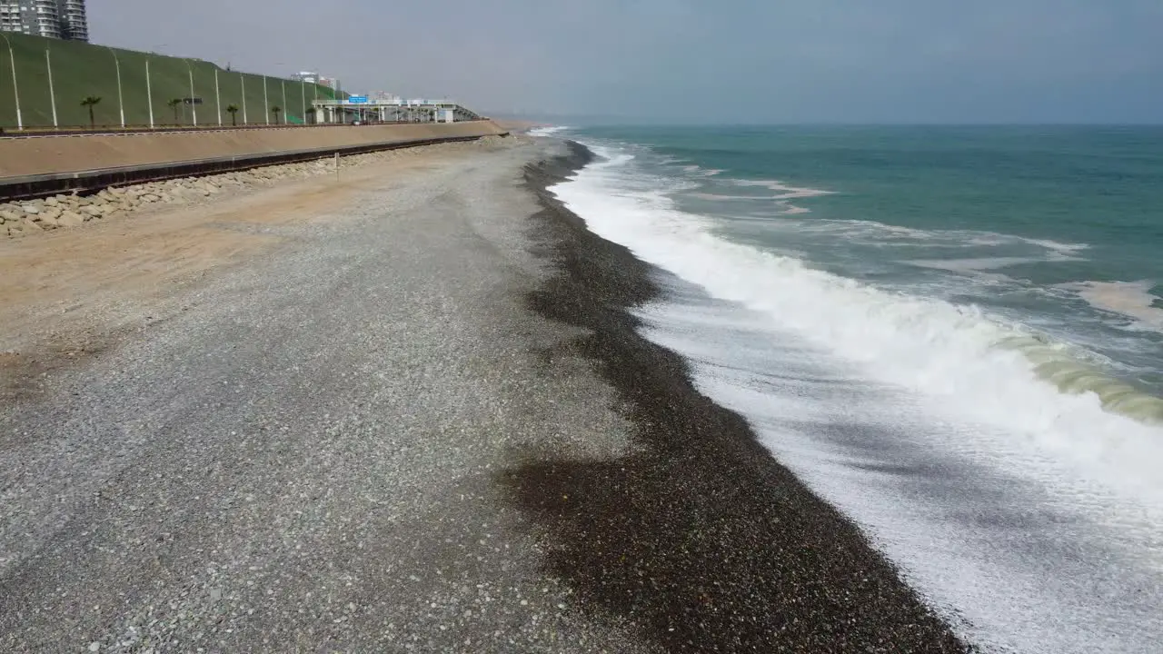 Fast drone 4k footage of a rocky beach in Lima Peru