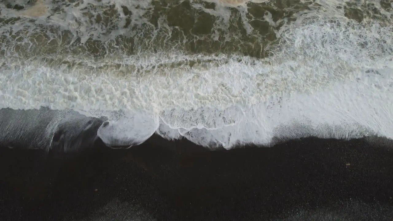 Drone video of a rocky ocean beach shore