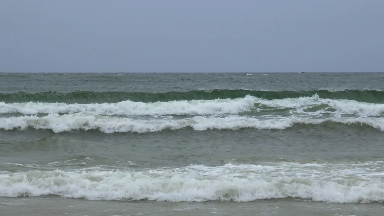 Waves crashing into shore of baltic sea