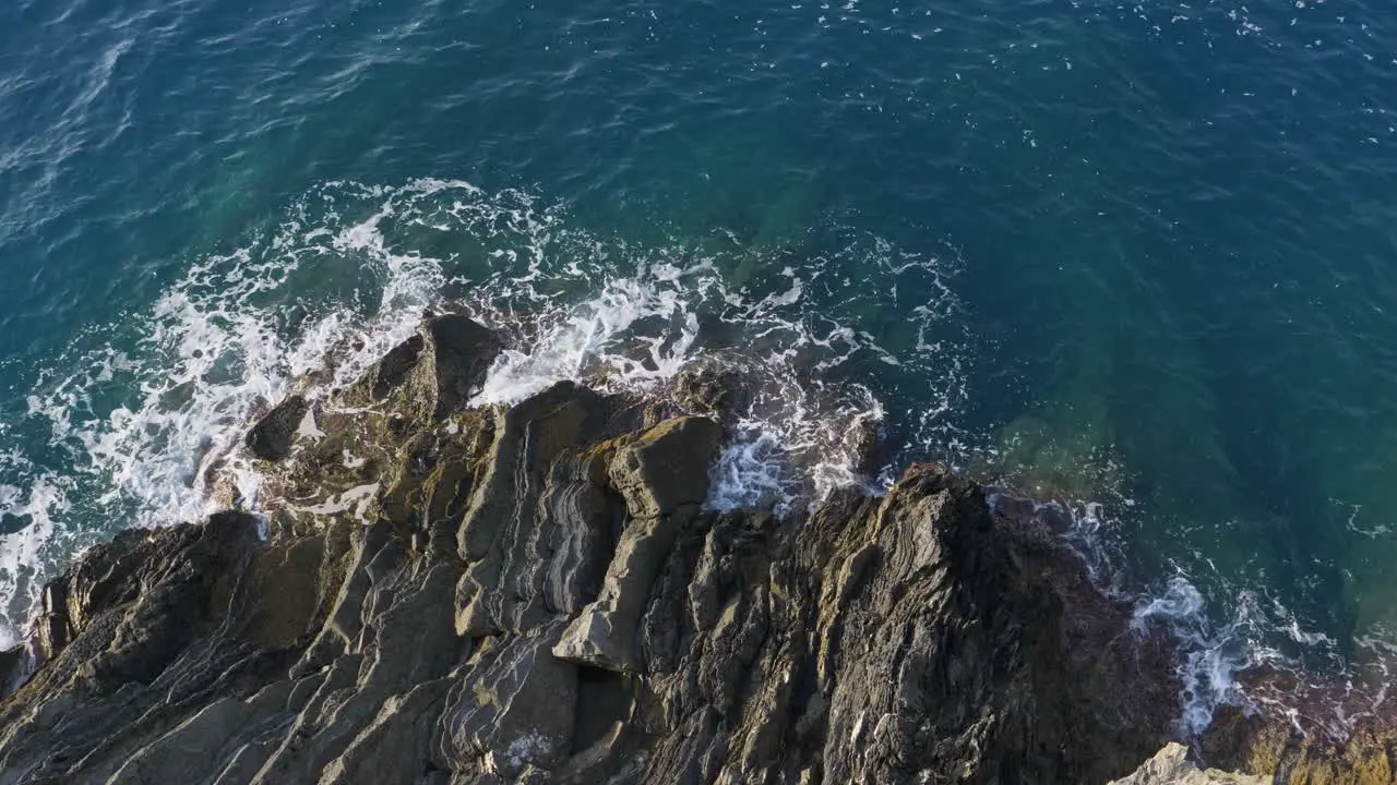 Waves crashing on rocks