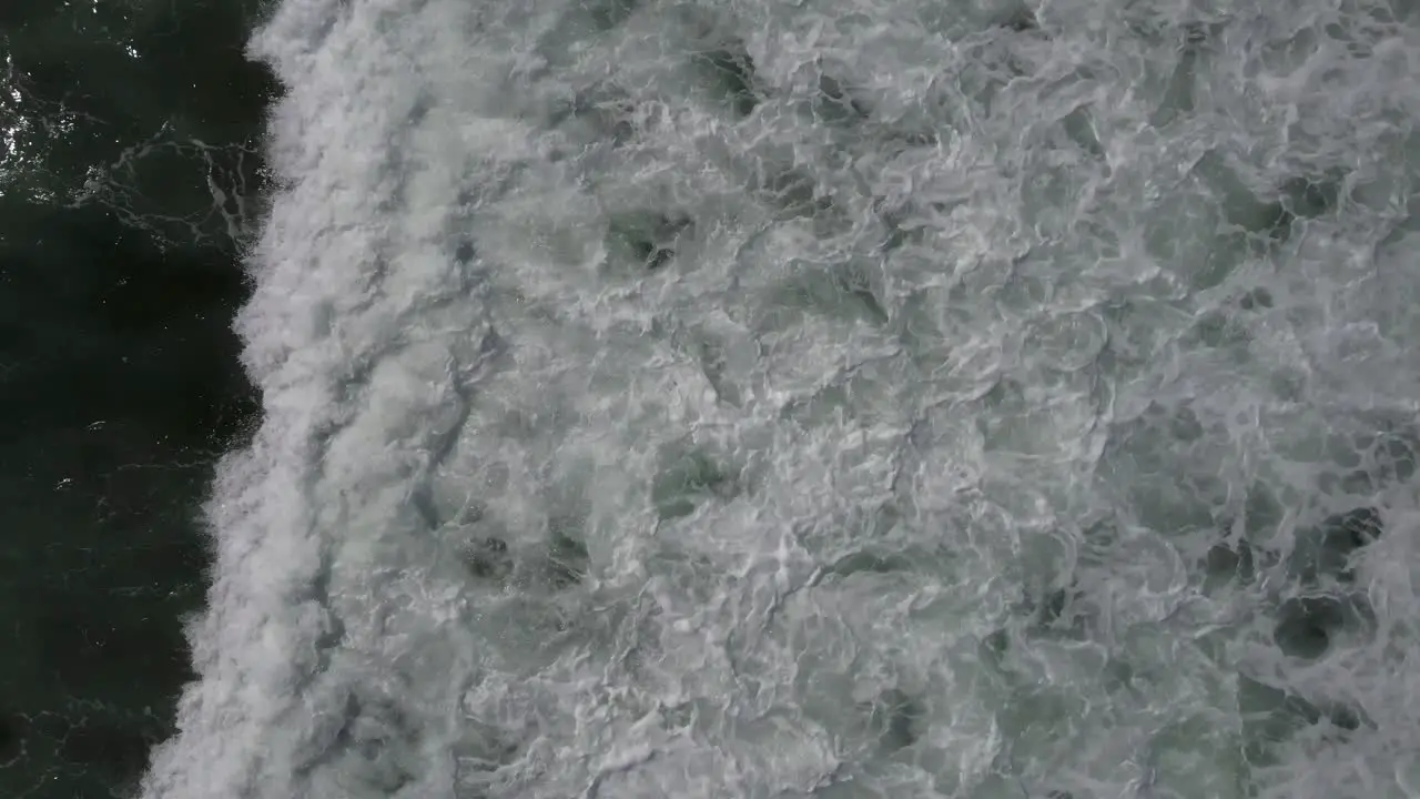 Aerial Waves breaking from top down angle