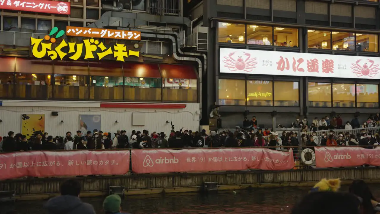 Crowds of Halloween Goers Line the Streets of Dotonburi River in Osaka