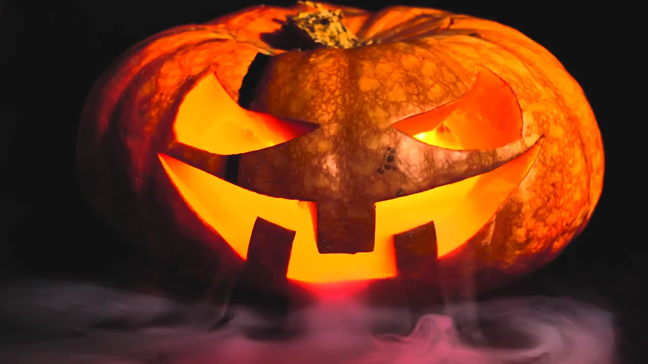 Halloween pumpkin in smoke