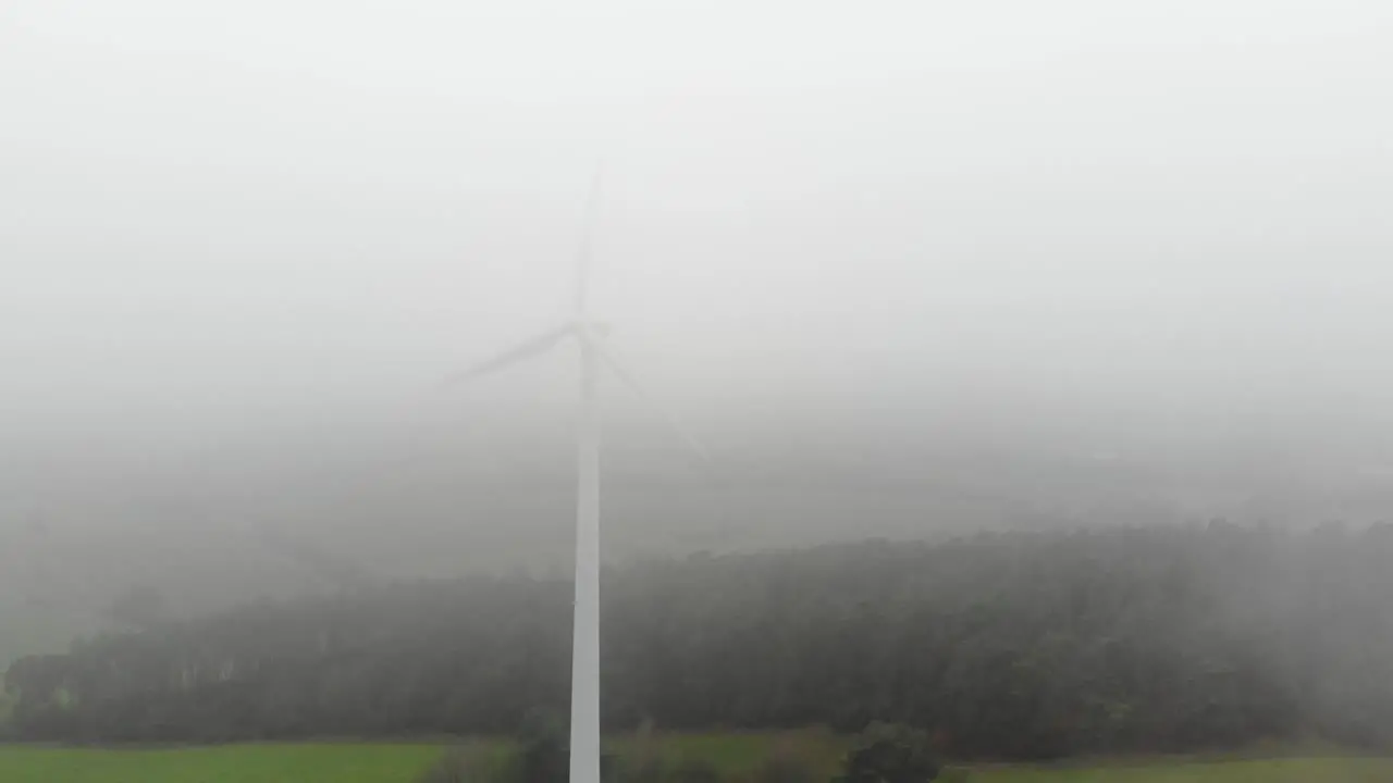 Windmill in foggy dew Wind Energy