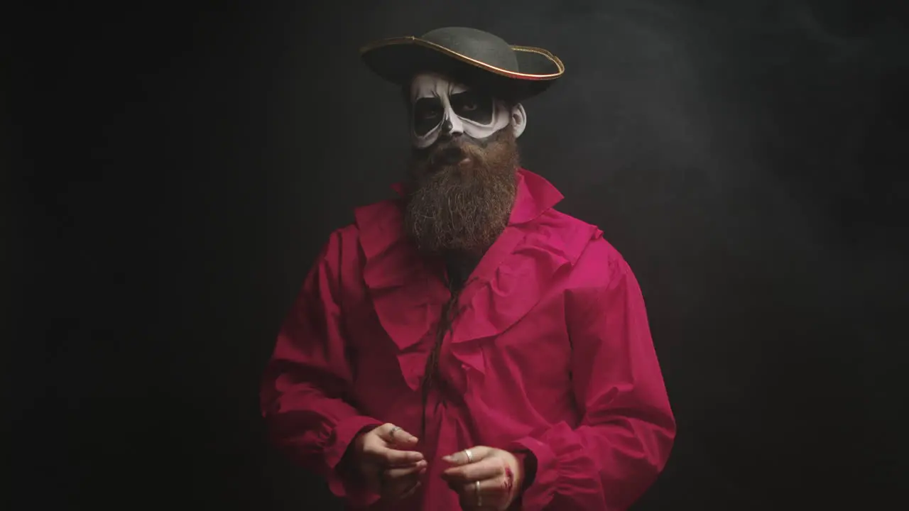 Young man with a stylish hat disguised as a pirate