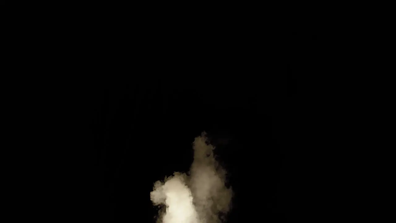 Small smoke cloud lit with pulsating fire light that almost reaches the top of the screen