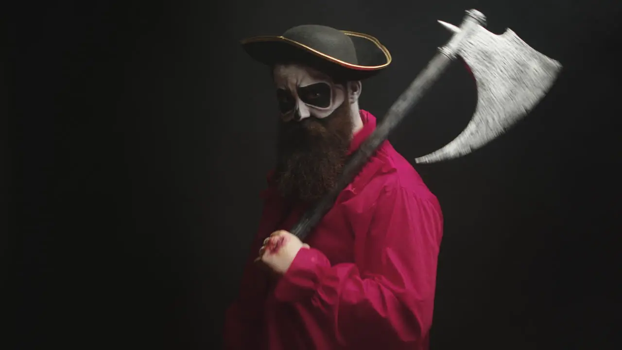 Scary bearded man dressed up like a pirate