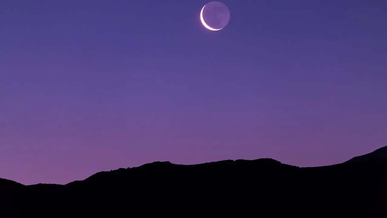 Stunning Moonrise Over Mountain in Twilight Dark Night Time and Pink Night Sky Before Sun Rise in Iran