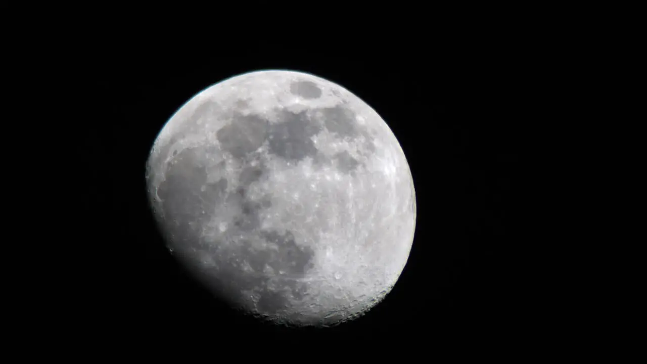 Detail View Of Last Quarter Moon Moving In The Darkness Of Night