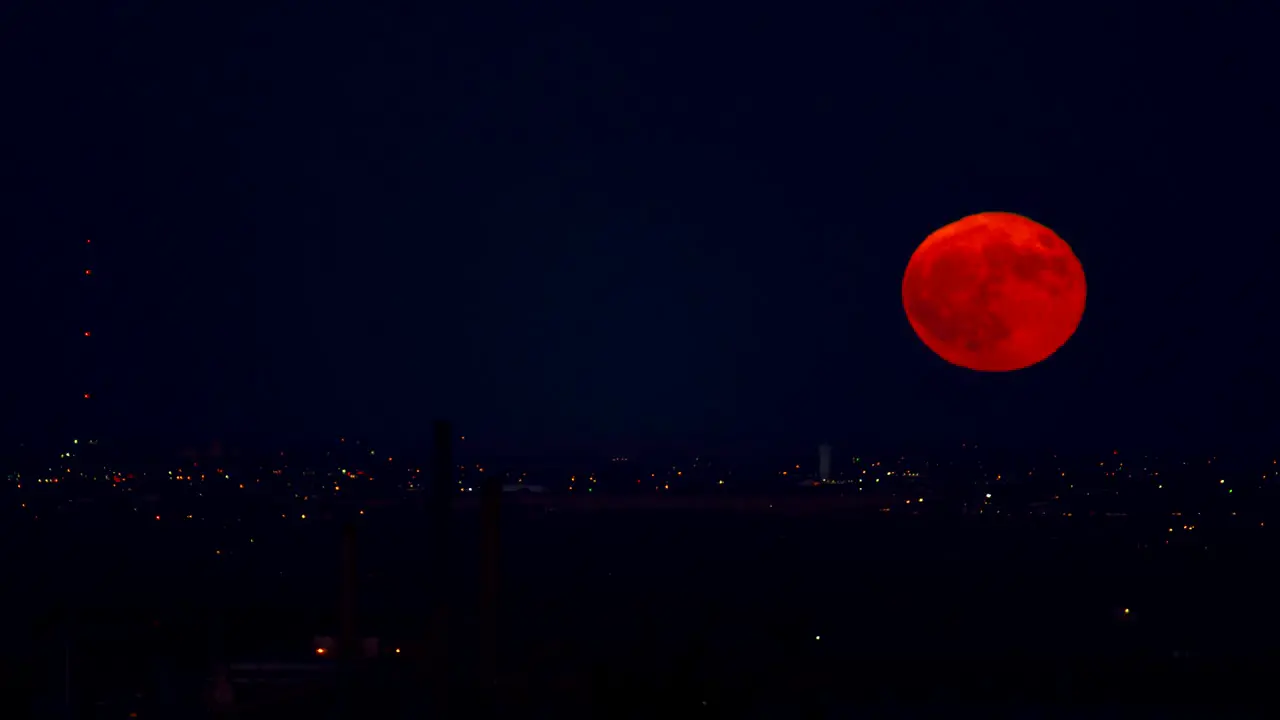 Time Lapse of blue moon rising above Boulder Colorado