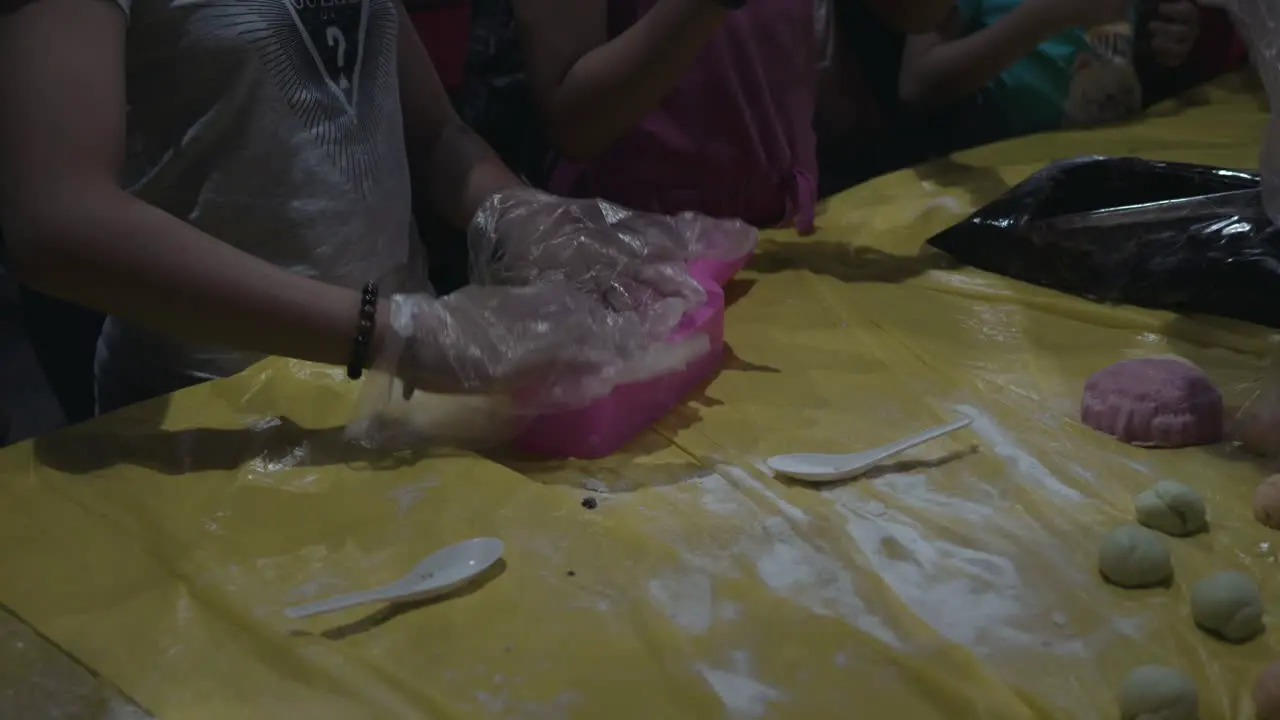 4K Children learning to make moon cake