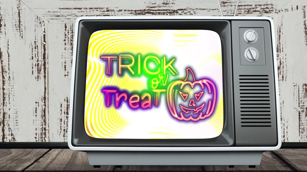 Animation of trick or treat halloween text on screen of vintage tv