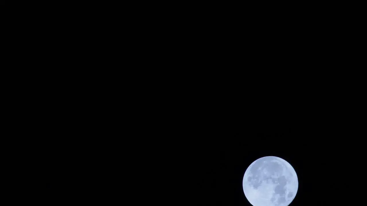 Medium clean shot of moon over Portugal