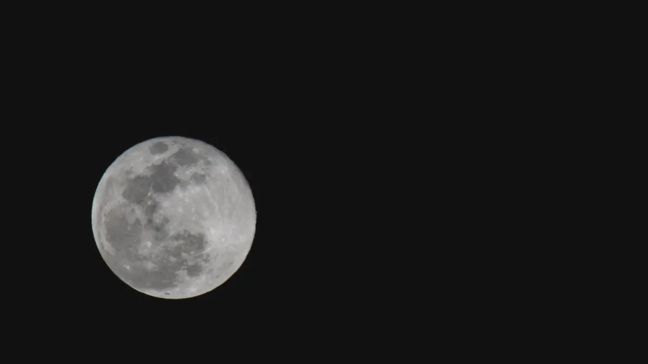 The moon illuminates the night sky