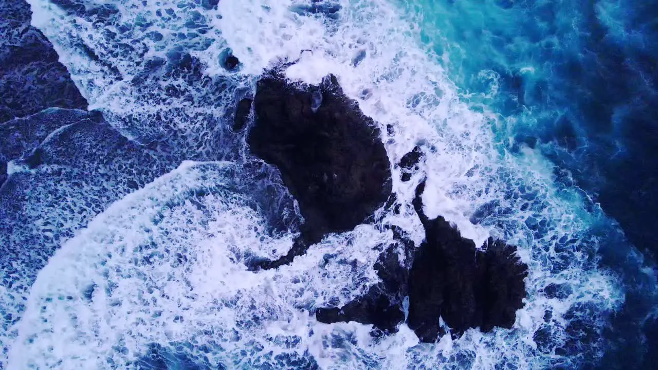 Dron shot of mountains and big waves in Canary Island