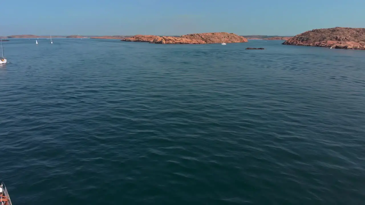 Tourist Luxury Yacht On the Blue Calm Ocean On A Sunny Day in Sweden Aerial shot