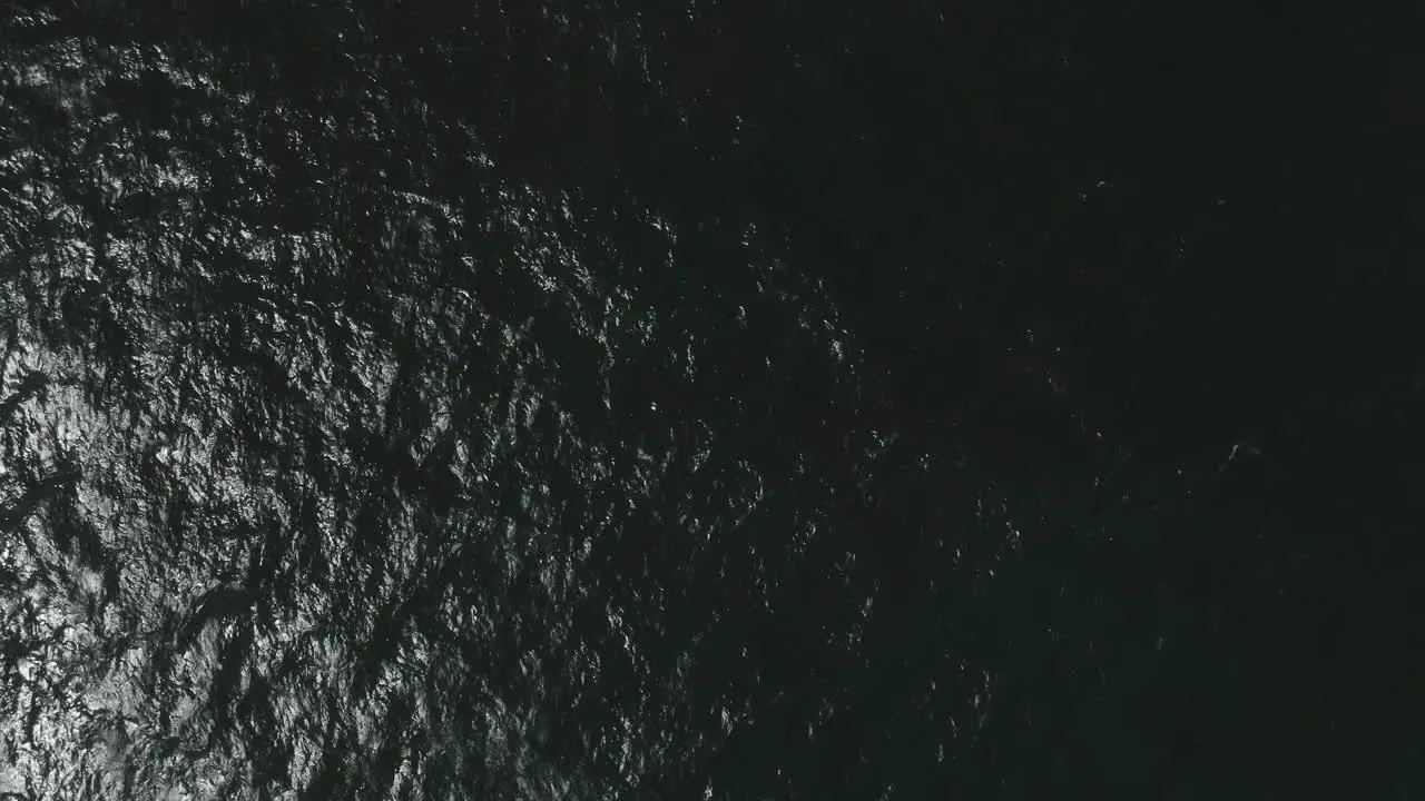 4k Top view shot of dark beautiful ocean sea water