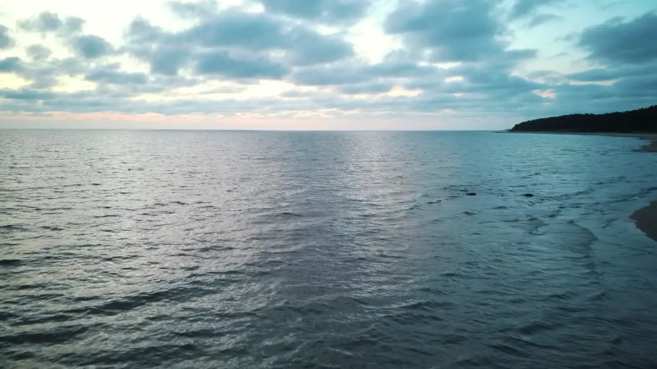 Dron Flying Over Sea in a Beautiful Sunset