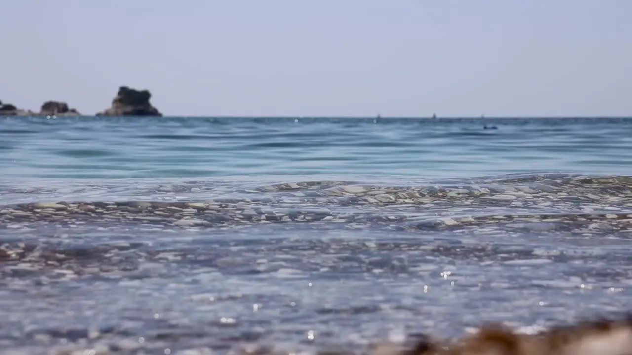 Diver entering clear blue sea