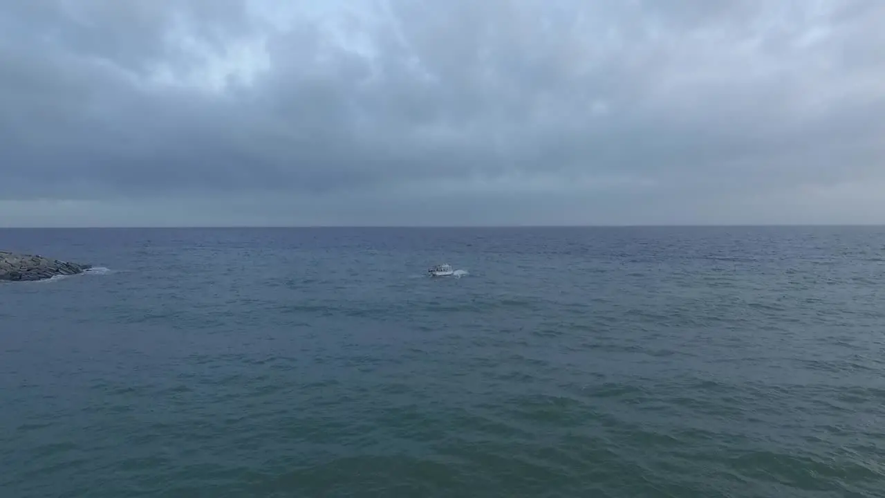 Aerial tracking over speedboat sailing offshore