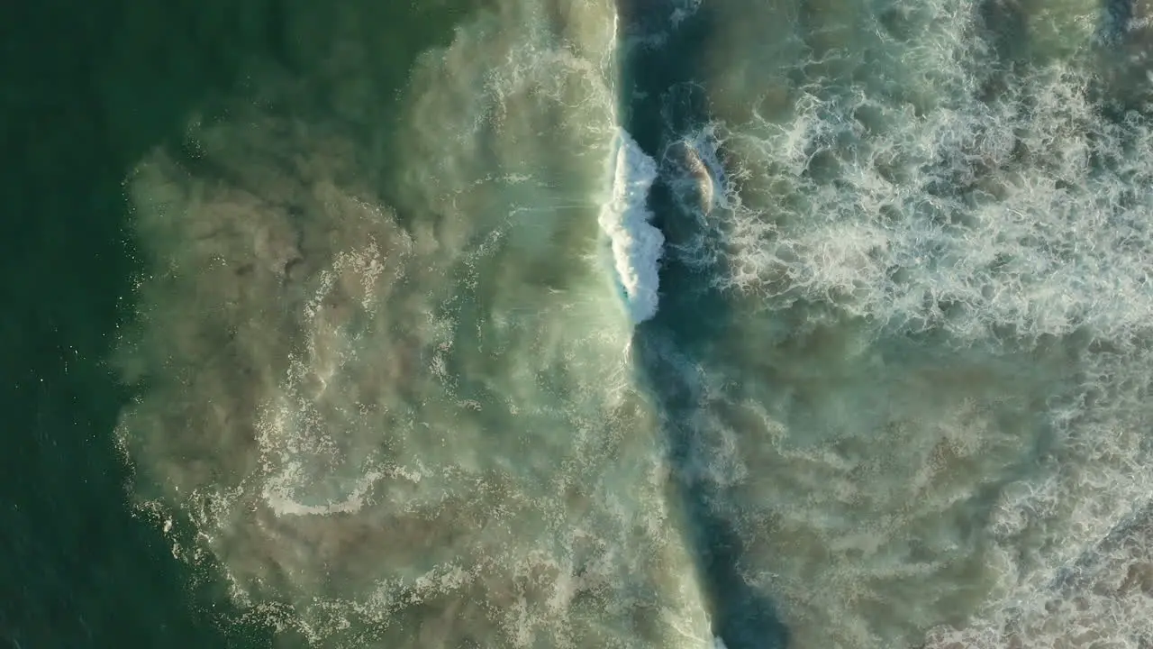 Ocean Waves Breaking With White Foam At Llandudno Beach Cape Town South Africa aerial top down