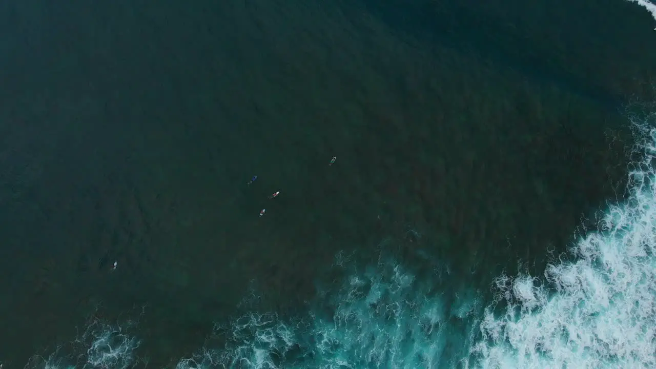 Aerial footage of surfers enjoying the waves at Mount Irvine Bay on the Caribbean island of Tobago