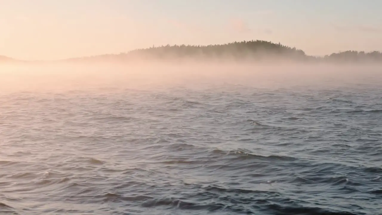 Windy and misty sea during sunset golden hour in Southwest Finland in autumn