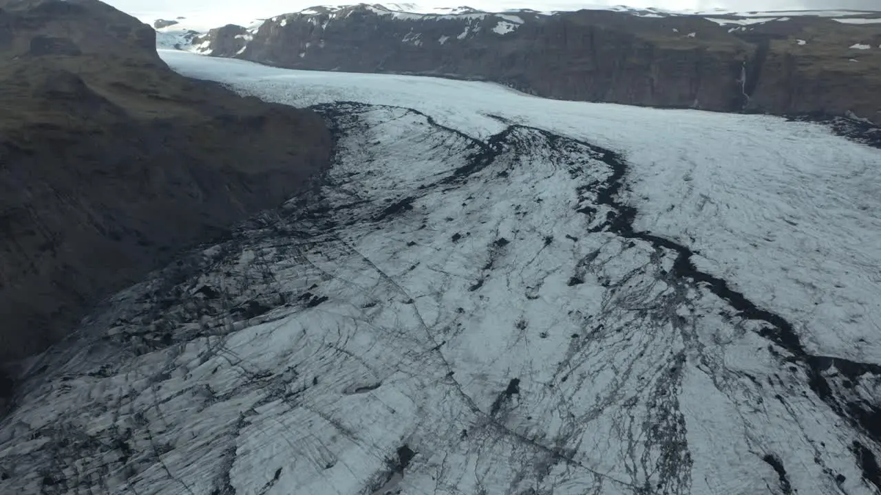 Cracked ice surface of frozen mass Sólheimajökull glacier aerial