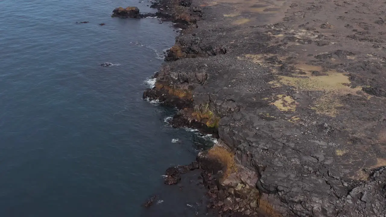 Volcanic basalt shoreline of Snæfellsnes peninsula in Iceland aerial