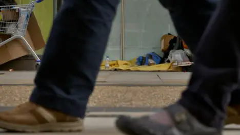 Long Shot of Homeless Persons Belongings In Doorway In Oxford 01