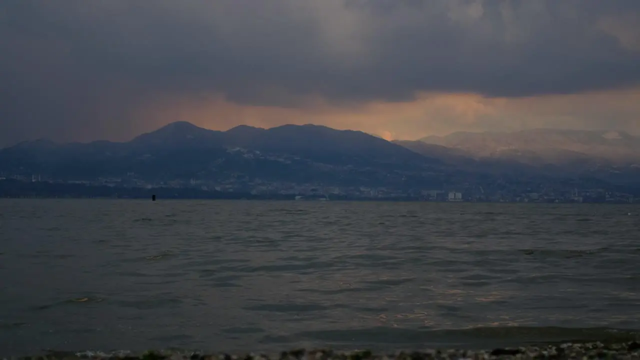 Mountains And Sea Cloudy Weather Reddish Sky