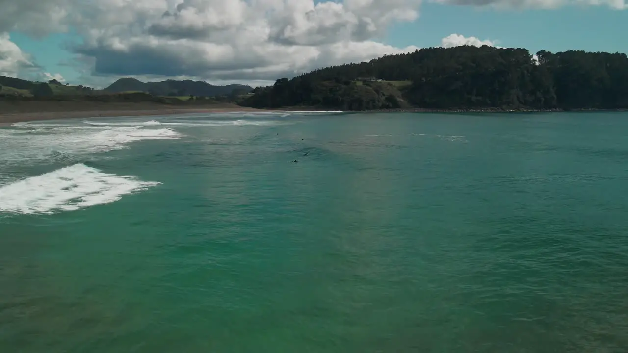 Surfers waiting for the next wave