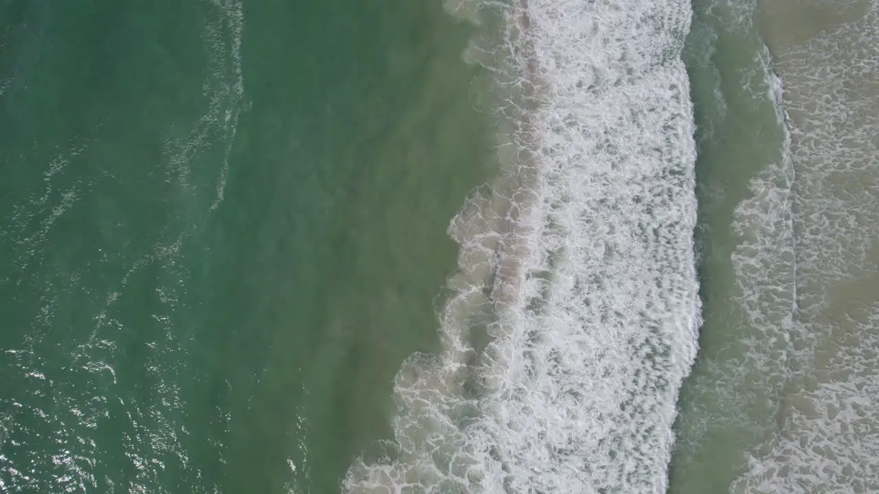 Coral Sea Waves Splashing At The Coast Of Palm Beach In Gold Coast Queensland Australia On A Sunny Summer Day