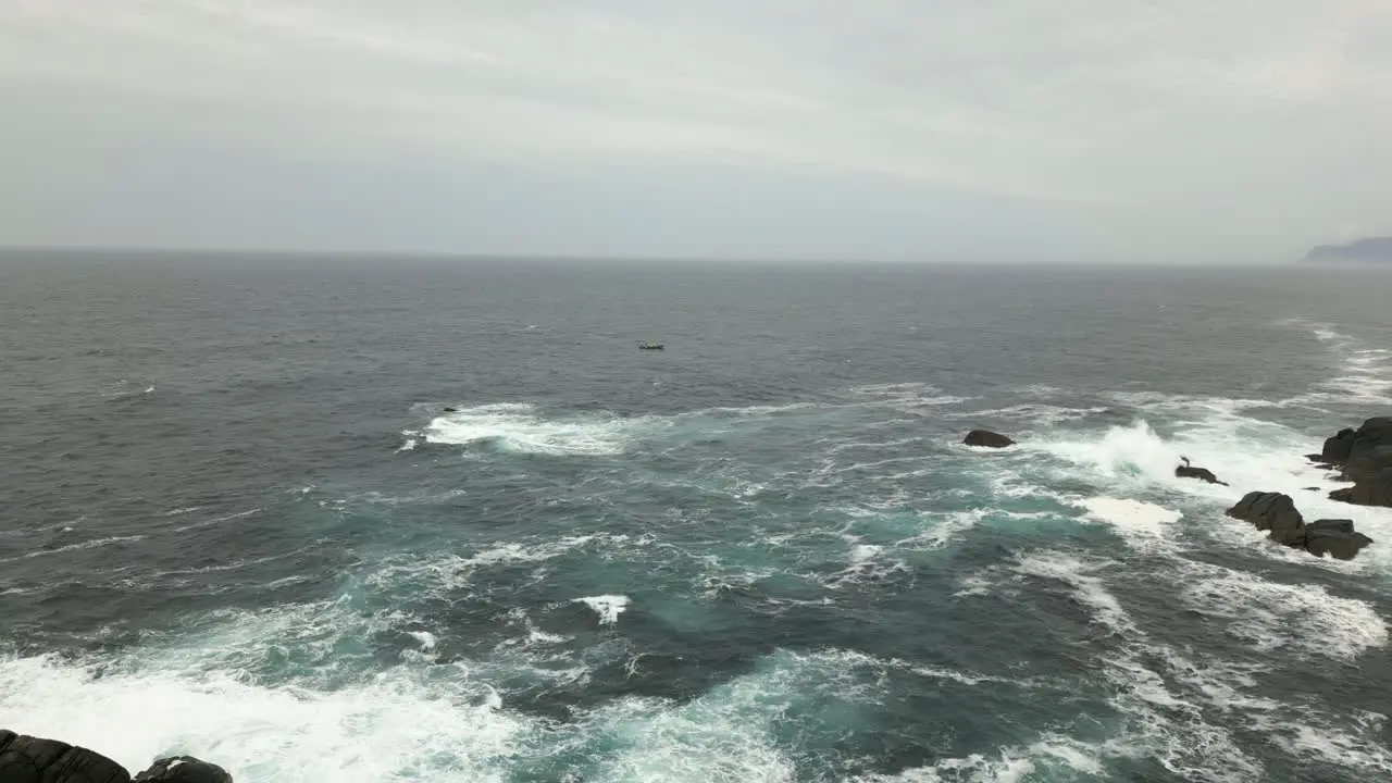 Bad Sea with Rib Boat just outside of Kråkenes Lighthouse close to Måløy Norway