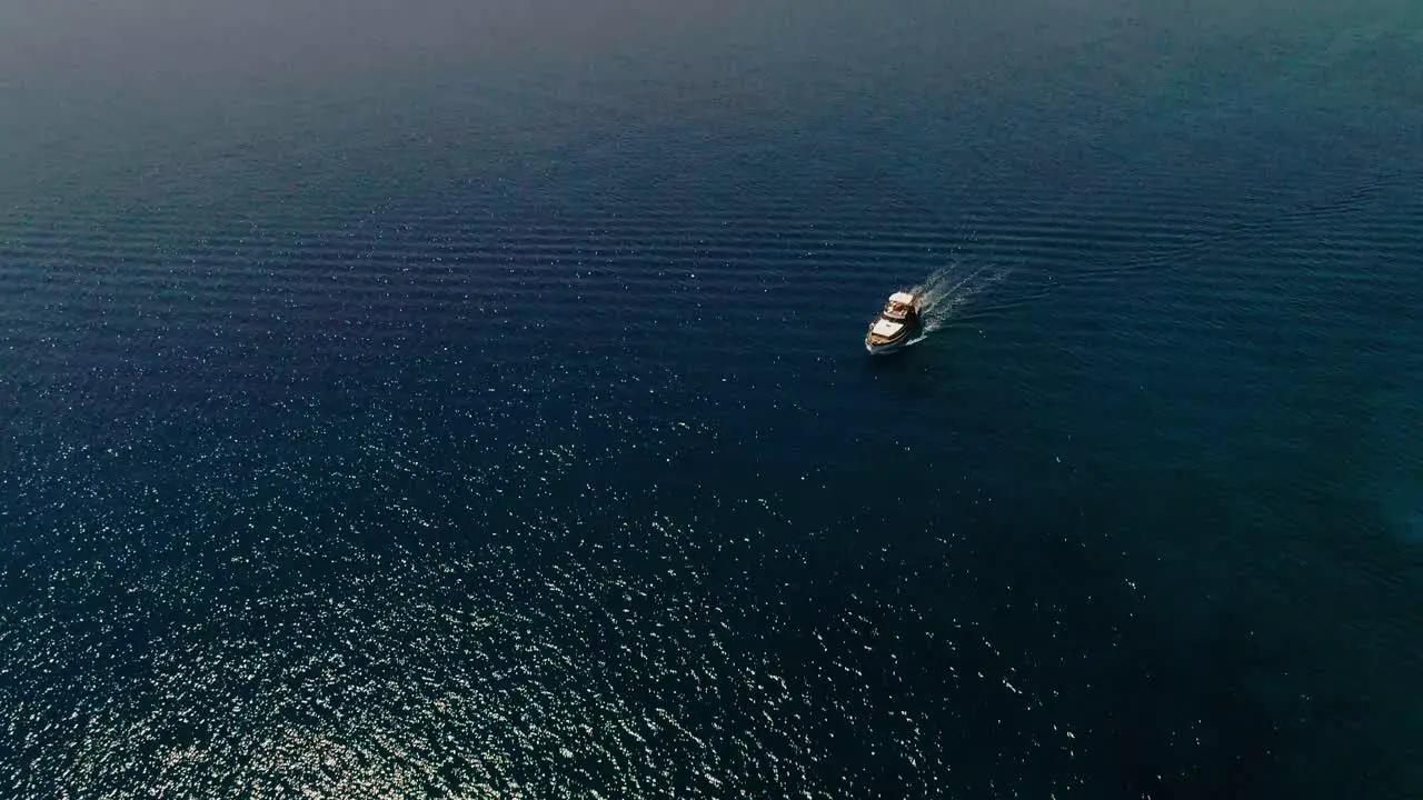 Drone shot over the yacht boat and sea summer in Agios Nikolaos Crete Greece