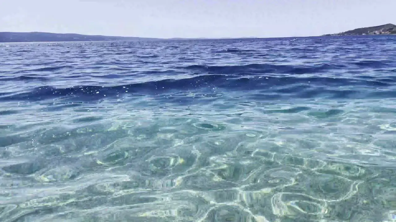 Beautiful crystal clear Adriatic Sea sparkling on summer sun in Croatia