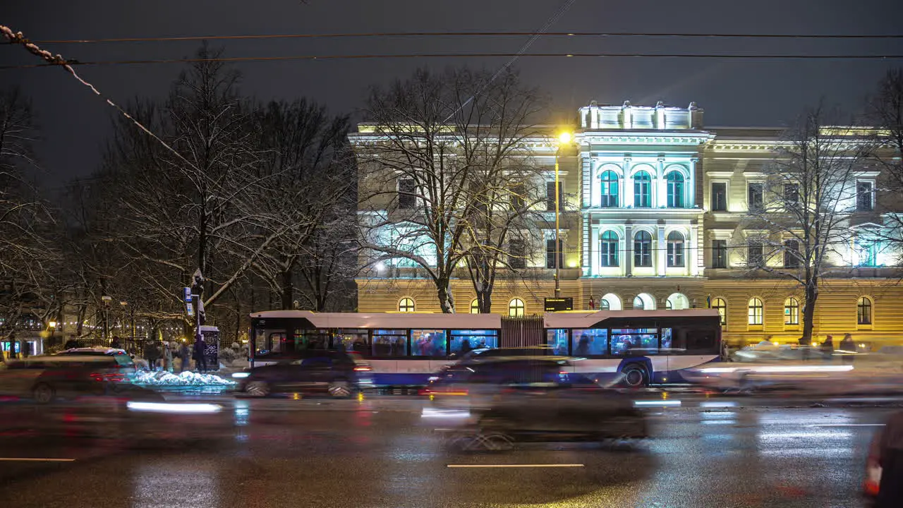 Time lapse illuminated road and bus station at night  Riga Latvia