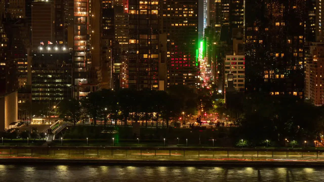 Time Lapse of traffic at the intersection of FDR Drive and UN Building and East 47th Street at Night in Manhattan New York City