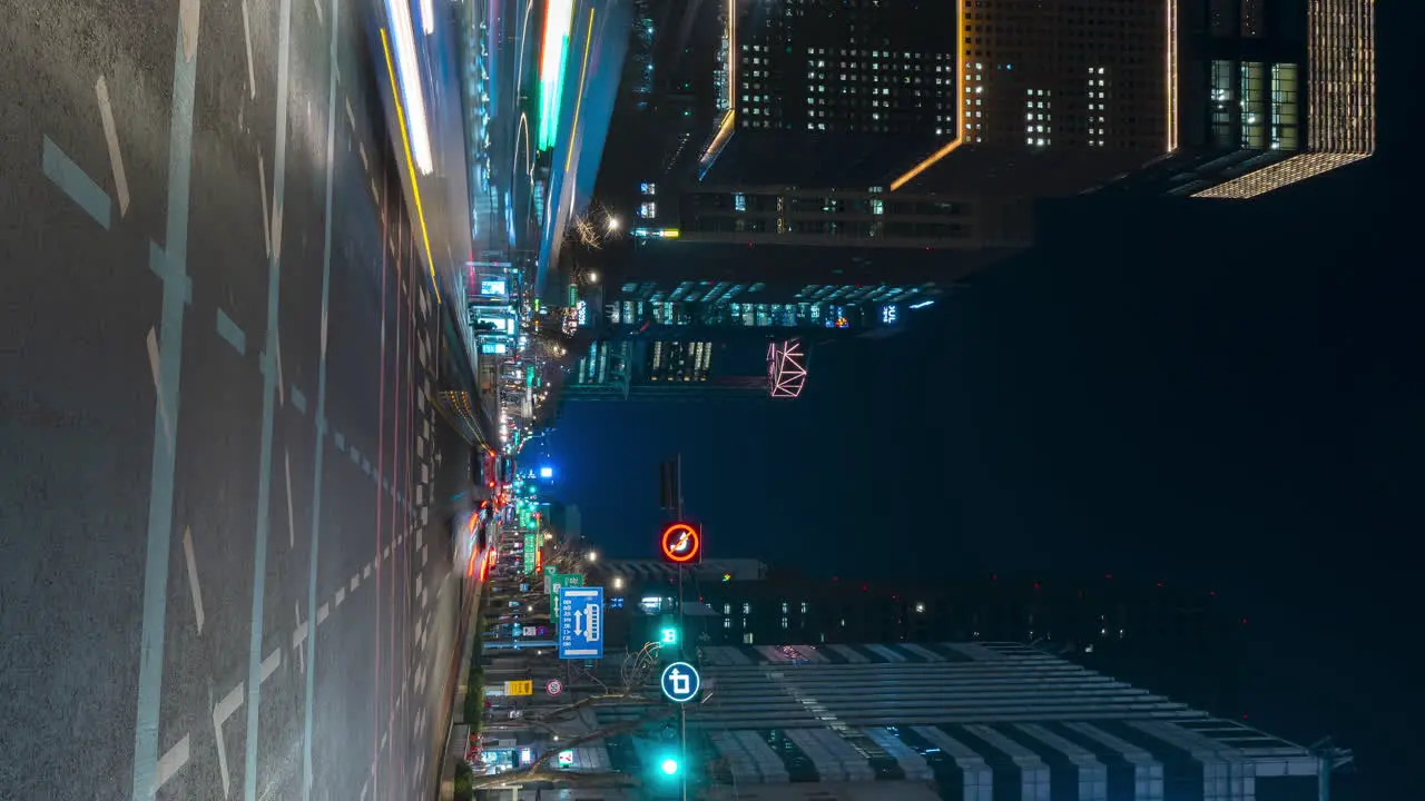 Timelapse At Night Jong-ro Road In Seoul Business Downtown With Vehicles Moving Both Sides Vertical view