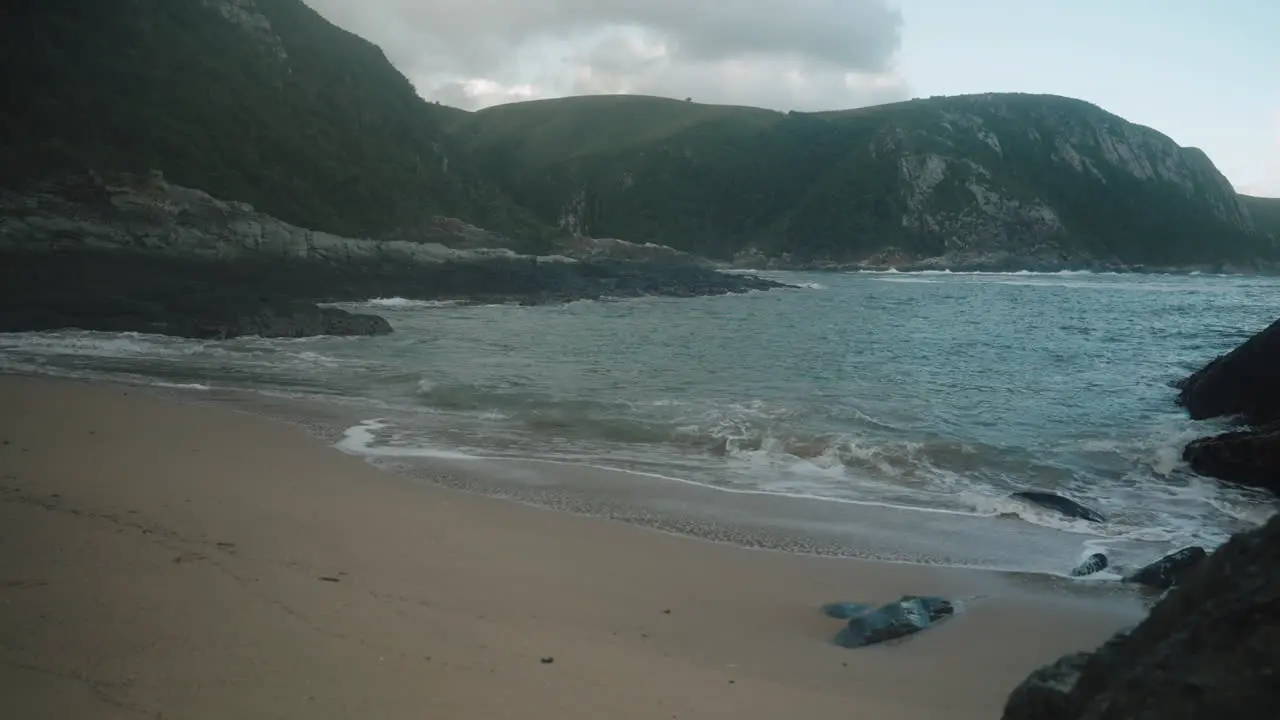 Waves flowing on a small beach