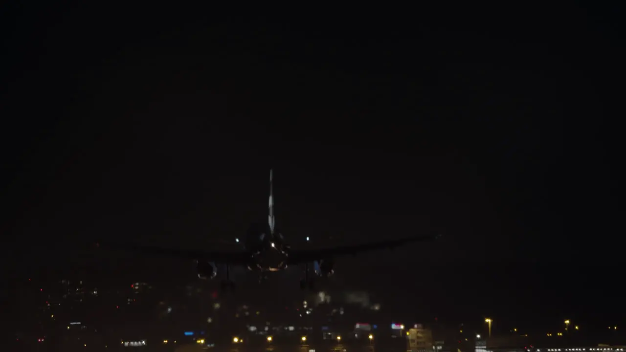 Airplane in the night sky