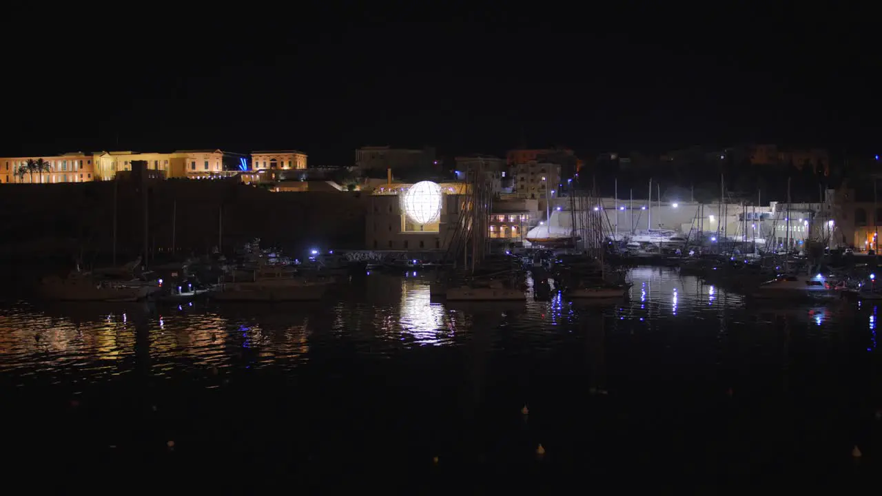 Panoramic Night view of harbour Three Cities on the island of Malta