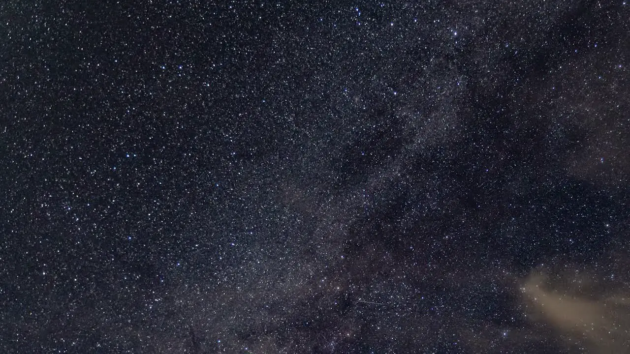 Milky Way and star time lapse with moving clouds airplanes on clear night until dusk