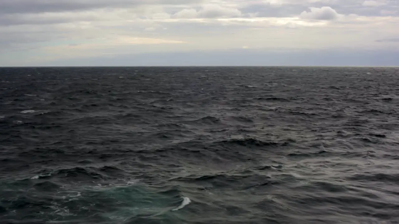 View from ship of dark rough cloudy Sea between Prince Edward Island and La Baie Saguenay