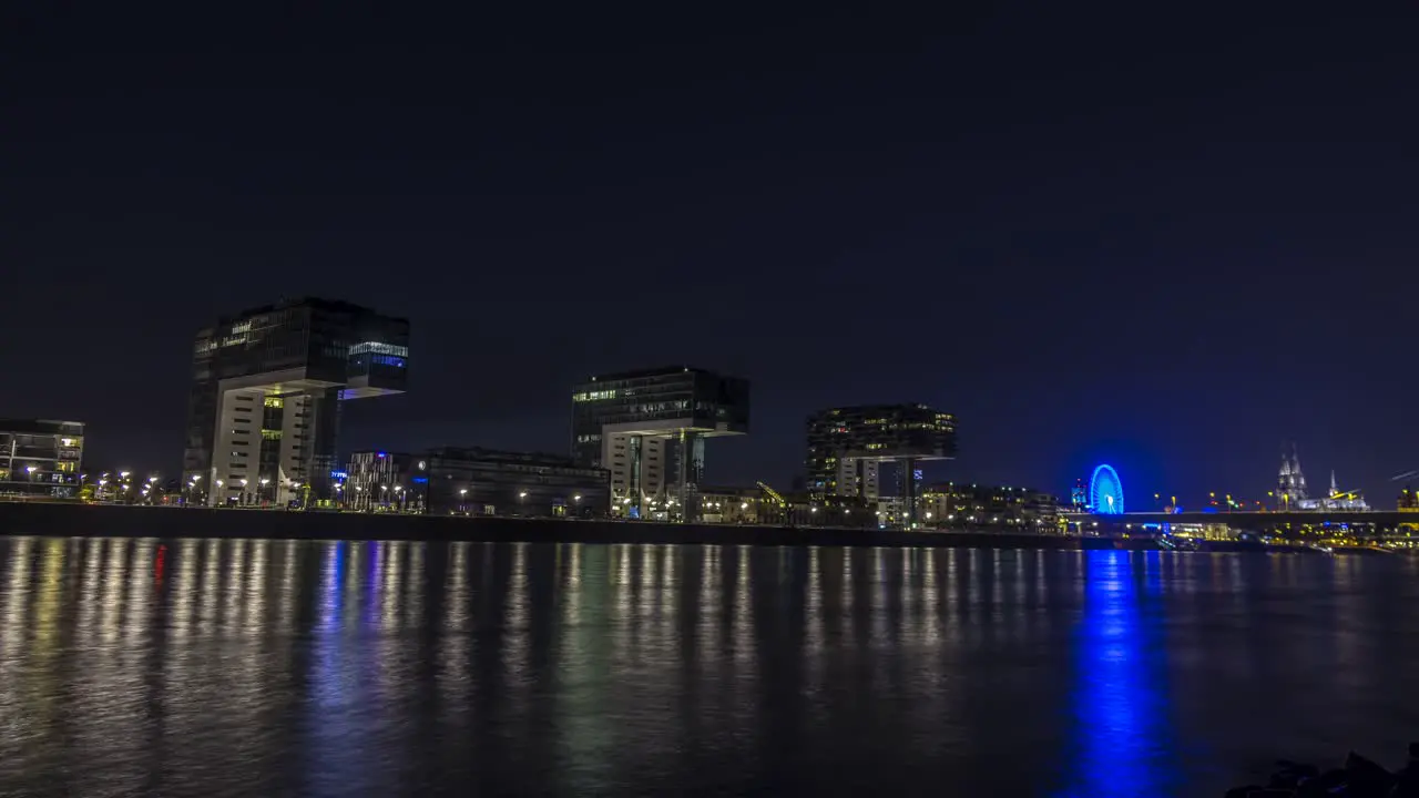 The Famous Kranhaus In The Rheinauhafen Of Cologne As Viewed From The Rhine In Germany At Night timelapse