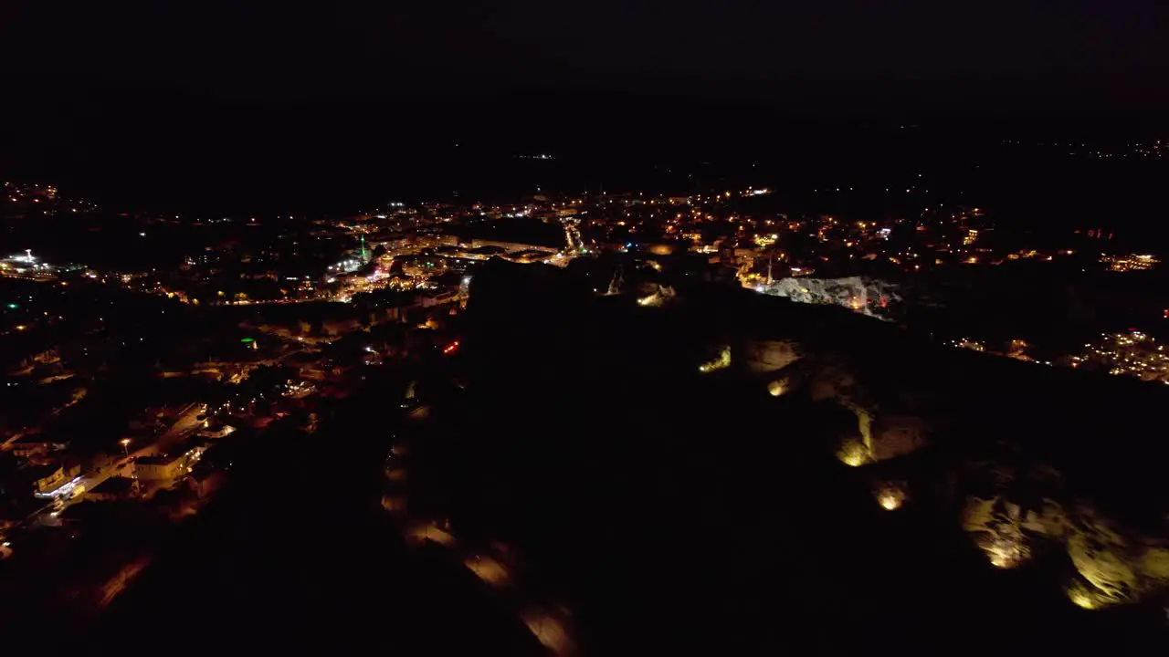 Aerial Shot of Urgup Cappadocia Caves at Night in Turkey